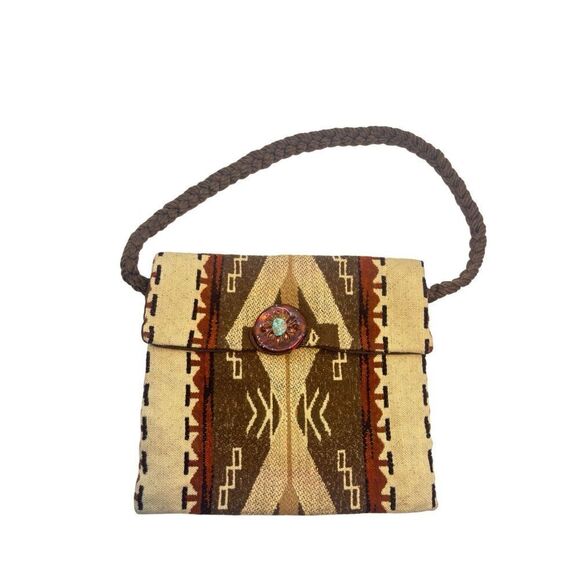 This is a bohemian-style shoulder bag with a braided strap. - Picture 3 of 8
